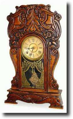 C.1900, Wm.L. Gilbert "Egyptian No. 60" pressed oak kitchen clock — Antique Clocks Price Guide