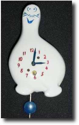 C.1940, Lux Clock Mfg Co., Waterbury, Conn., SHMOO (white) figural shelf clock — Antique Clocks Price Guide