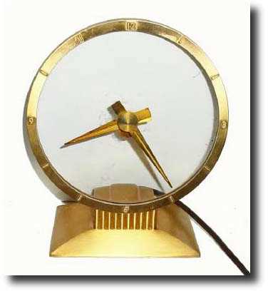 C.1955, Jefferson Electric Co., 110 volt electric Golden Hour mystery clock, — Antique Clocks Price Guide