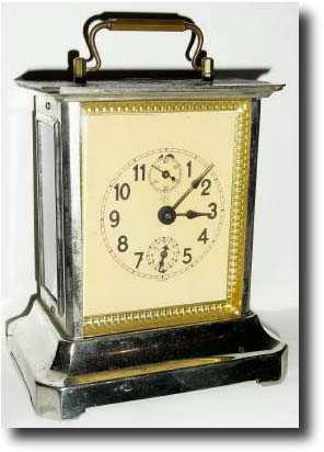 C.1900, Junghans carriage alarm clock with a music box in the base. — Antique Clocks Price Guide