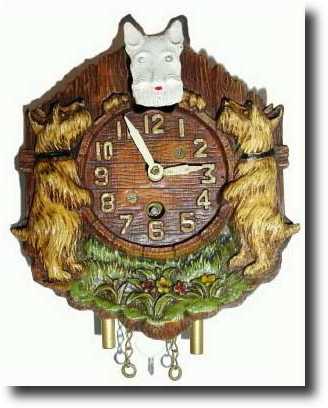 C.1935, Lux Clock Mfg Co., Waterbury, Conn., Playful Scotties wall clock — Antique Clocks Price Guide