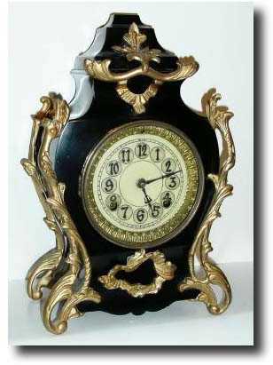 C.1900, New Haven Clock Co., New Haven, Conn. CORYDON, Enameled Iron case clock. — Antique Clocks Price Guide