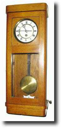 C.1920, German, Oak Cased wall regulator in an oak Art Deco style case — Antique Clocks Price Guide