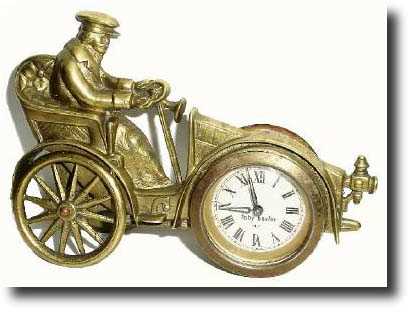 C.1920, English, Toby Baxter, 30 hour desk novelty clock in the form of a car and driver. — Antique Clocks Price Guide