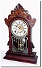 C.1885, Wm.L. Gilbert, "Parlor", Walnut Mantel clock in generally good condition.