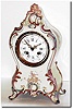 C.1900, French, a Porcelain China Clock in beige with saccents in rose pink and light blue.