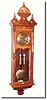 Mixed lot: A circa 1890 German Vienna style wall regulator, with new top and new door (with modern pressed trims), and the case refinished, the movement now with Waterbury style hands.