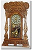C.1905, New Haven Clock Co., "Norwich Linen" model pressed oak gingerbread in good condition.