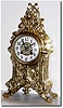 C.1890, French, Brass Architectural clock, the front with a fountain motif.