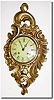 C.1950, Sweden, Ljungstrems Urinderal-fabrik, gilt wood cartel clock in the French style, with "Westerstrand' on the well painted convex dial (dial is painted yellow).