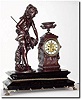 C.1890, French, Bronzed Spelter Figural Clock of a girl fishing with a net.