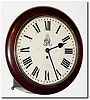 C.1931 (dated), English, Potts and Sons, Leeds, a good chain fusee postal clock with British royal crest on both the movement and the dial.