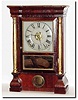 C.1868, Seth Thomas, small Empire column clock, 8-day, T/S/Alarm in rosewood, as-found.