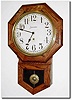 C.1910, Sessions Short Drop in solid oak, in generally clean condition.