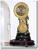 C.1890, Mixed lot: A good bell strike French movement, now mounted to a bronze memorial stand, from the same period, showing a woman with a man and his dog, the pendulum swinging in front of the couple.