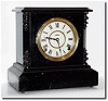 C.1900, Ingraham black enameled wood shelf clock, with restorations.
