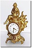 C.1910, Incomplete, an American ladies dresser clock, gilt spelter with about 50 percent gilding intact but with an incomplete movement.