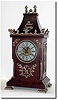 C.1890, French, Unusual Mantel Clock, Black walnut with silvered bronze mounts, feet and columns.