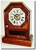 C.1868, Seth Thomas mantel clock, "Octagon Top' time and alarm cottage in very clean restored condition.