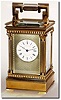C.1900, French, Brass Cased Carriage Clock time, strike, repeat and alarm, in a classic Anglais Riche case with fluted Corinthian columns and fluted handle.