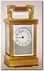 C.1900, French, Brass Cased Carriage Clock time and strike, in an unusual case with fancy embossing on all flat surfaces (burnished trefoils on a grooved background).
