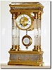 C.1890, French for J.E. Caldwell, Philadelphia, a 4 column Empire clock of Baccarat crystal.