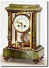 C.1900, French, Japy, Fine Onyx and Ormolu crystal regulator, with bow front and full standing green onyx columns with cloisonne bases.