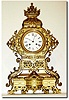 C.1890, French, Bronze Architectural mantel clock, with extra fancy detail., the central tower pierced and with profuse use of scrolls and teardrops, and two pierced baskets leading to a fluted finial at the top.