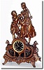 C.1890, French, Bronzed Spelter Figural clock of 2 young girls fresh from the orchard, with a basket of fruit, the girl on the left offering an apple to the girl in pigtails (with more fruit gathered in her skirt).