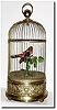 C.1890, French, a large Singing Bird in cage.