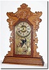 C.1896, E. Ingraham and Co, Pressed Oak gingerbread clock.
