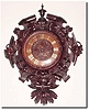 C.1850, French, Large Walnut Cartel clock with finely detailed carving of flowering vines.