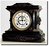 C.1880, Ansonia Clock Co., "La France' black enameled iron case clock in good, as-found condition.