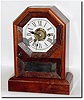 C.1868, Seth Thomas, Thomaston, Conn., "Octagon Top', time and alarm cottage clock in generally good condition.