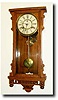 C.1891, Waterbury "Bruce" Oak Cased wall clock.