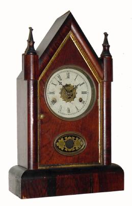 C.1875, William L. Gilbert Clock Co., "Winstead Gothic Extra", 30-hour time/strike/alarm steeple clock. — Antique Clocks Price Guide