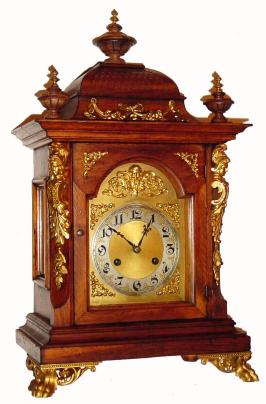 C.1900, German, Junghans, Walnut bracket clock with cast and gilded mounts, 8-day, QUARTER striking on 2 gongs. — Antique Clocks Price Guide