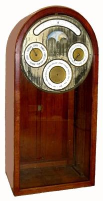 C.1900, English, H. M. Emanuel and Son, Large special purpose calendar movement, indicating plus and minus minutes at Noon, Date, Day of Week and Month, plus moon phase, mahogany case with double cabinet doors to the rear, glazed at front. — Antique Clocks Price Guide
