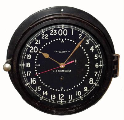 C.1945, Chelsea Clock Co., Boston, U.S. Government wardroom clock, black bakelite case with 24 hour dial and center seconds. — Antique Clocks Price Guide