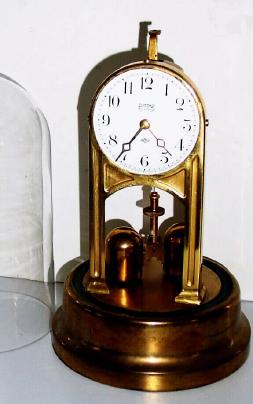 C.1911, Tiffany Electric Mfg Co., "Never-Wind", Electric battery timepiece. — Antique Clocks Price Guide