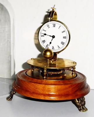 C.1974, Horolovar Co., (Clock Trade Enterprises), "Briggs Rotary" novelty timepiece. — Antique Clocks Price Guide