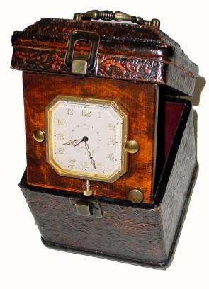 Mixed lot: Swiss, 8-day travel alarm clock. — Antique Clocks Price Guide