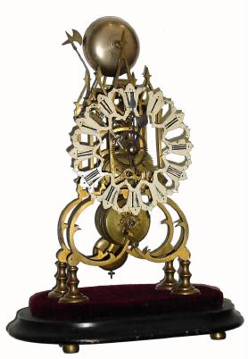 C.1900 English, single fusee skeleton timepiece with passing strike, classic Gothic frame, less dome. — Antique Clocks Price Guide