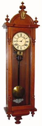 C.1900, Ansonia CAPITOL, Oak Cased wall regulator, 8-day spring, time and strike. — Antique Clocks Price Guide
