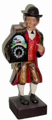 C.1960, German, Karl Griesbaum, Clock Peddlar and Whistler, with 30 hour pendulum clock with arched dial. — Antique Clocks Price Guide
