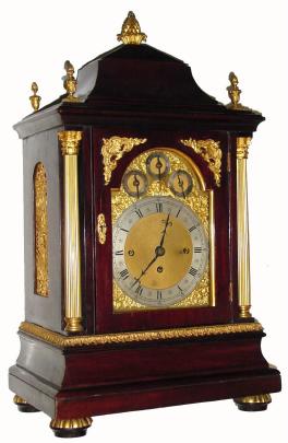 C.1890, Large, 3-fusee, 2-tune, 8-bell, quarter chime bracket clock, mahogany case with ormolu trim and finials. — Antique Clocks Price Guide