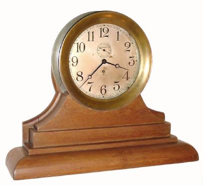 C.1920, Chelsea, Large 10" dial engine room timepiece, serial No. 121328, hinged button latch bezel, with a detachable mahogany base. — Antique Clocks Price Guide