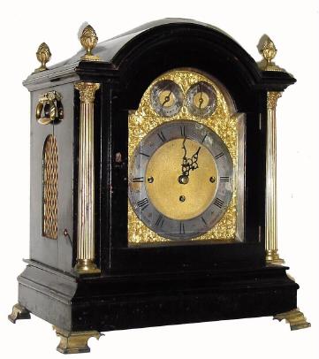 C.1890, English, 3-Fusee Westminster Chime bracket clock, ebonised case with fluted gilt columns to the side and pineapple finials at the top. — Antique Clocks Price Guide