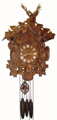 C.1890, German, Black Forest Trumpeter and Cuckoo, quarter striking, hunting motif wall clock, 3-weight. — Antique Clocks Price Guide