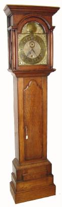 C.1740, English, F. Corral, Lutterworth, oak cased 30 hour tall clock with arched brass dial. — Antique Clocks Price Guide
